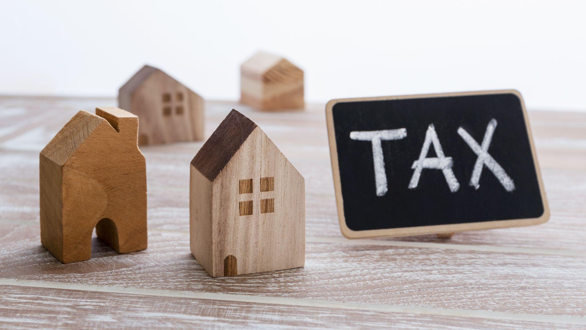 Houses with tax sign