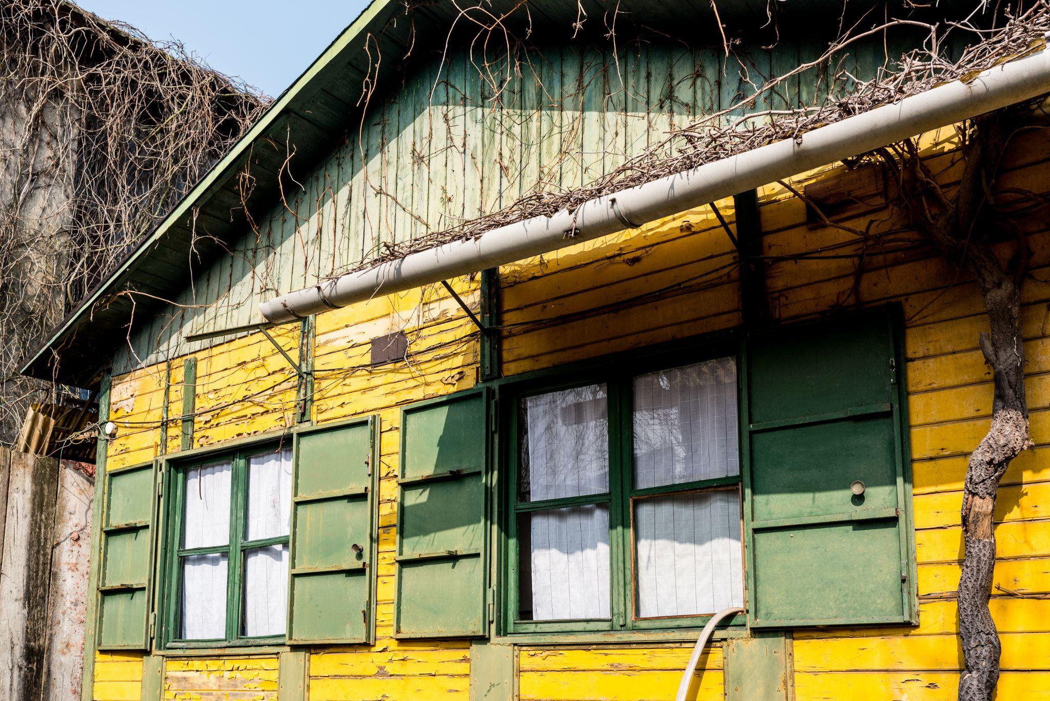 old wooden house in disrepair