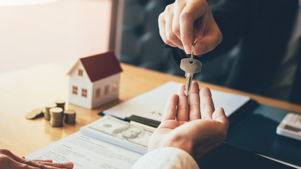 Home agents are handing out keys to new home buyers