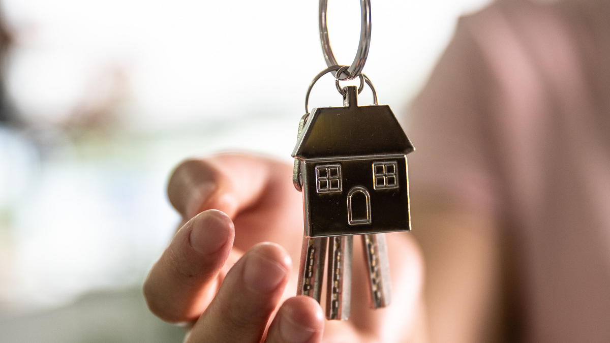 Person grabbing house key