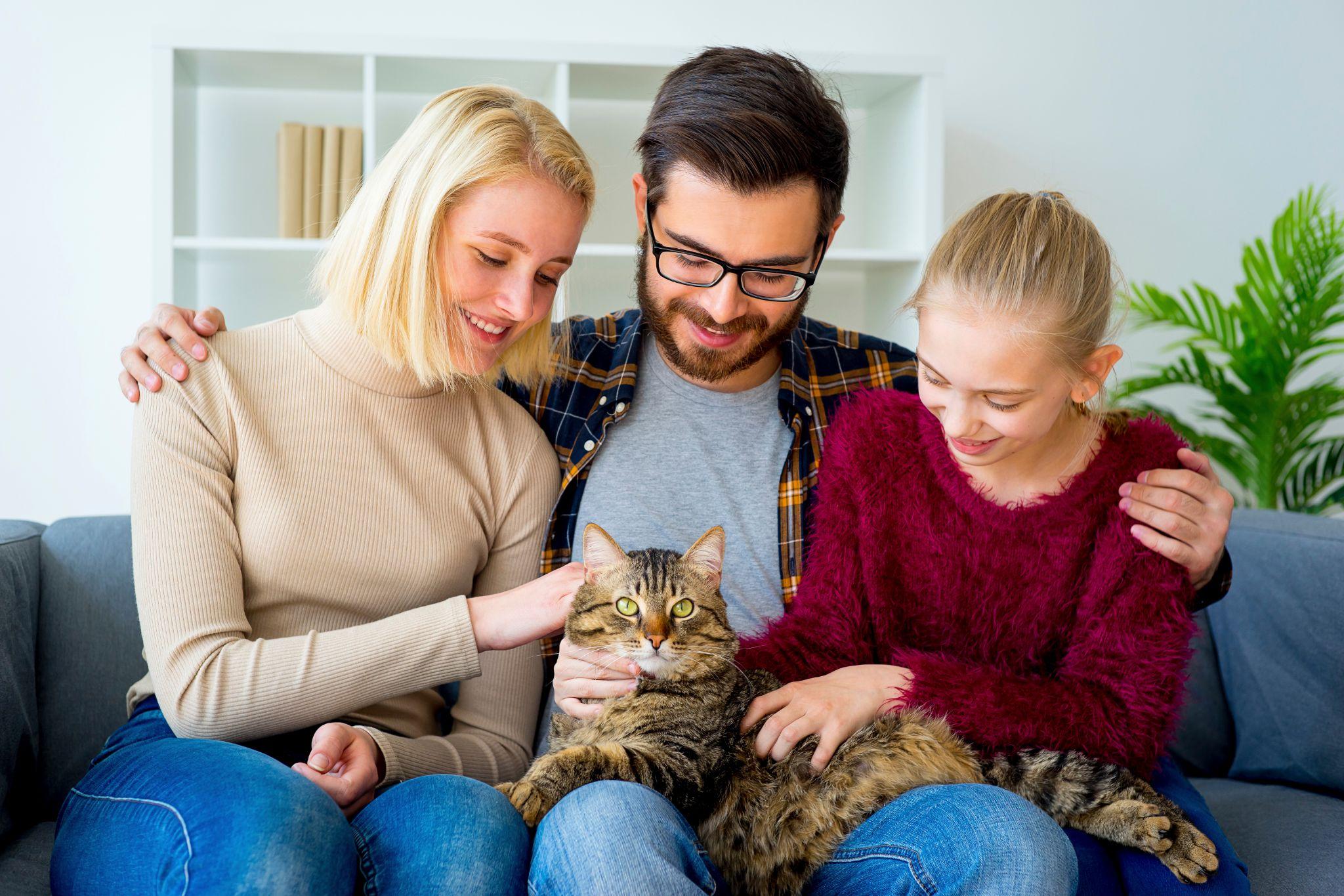 Family with a cat that wants to sell their home