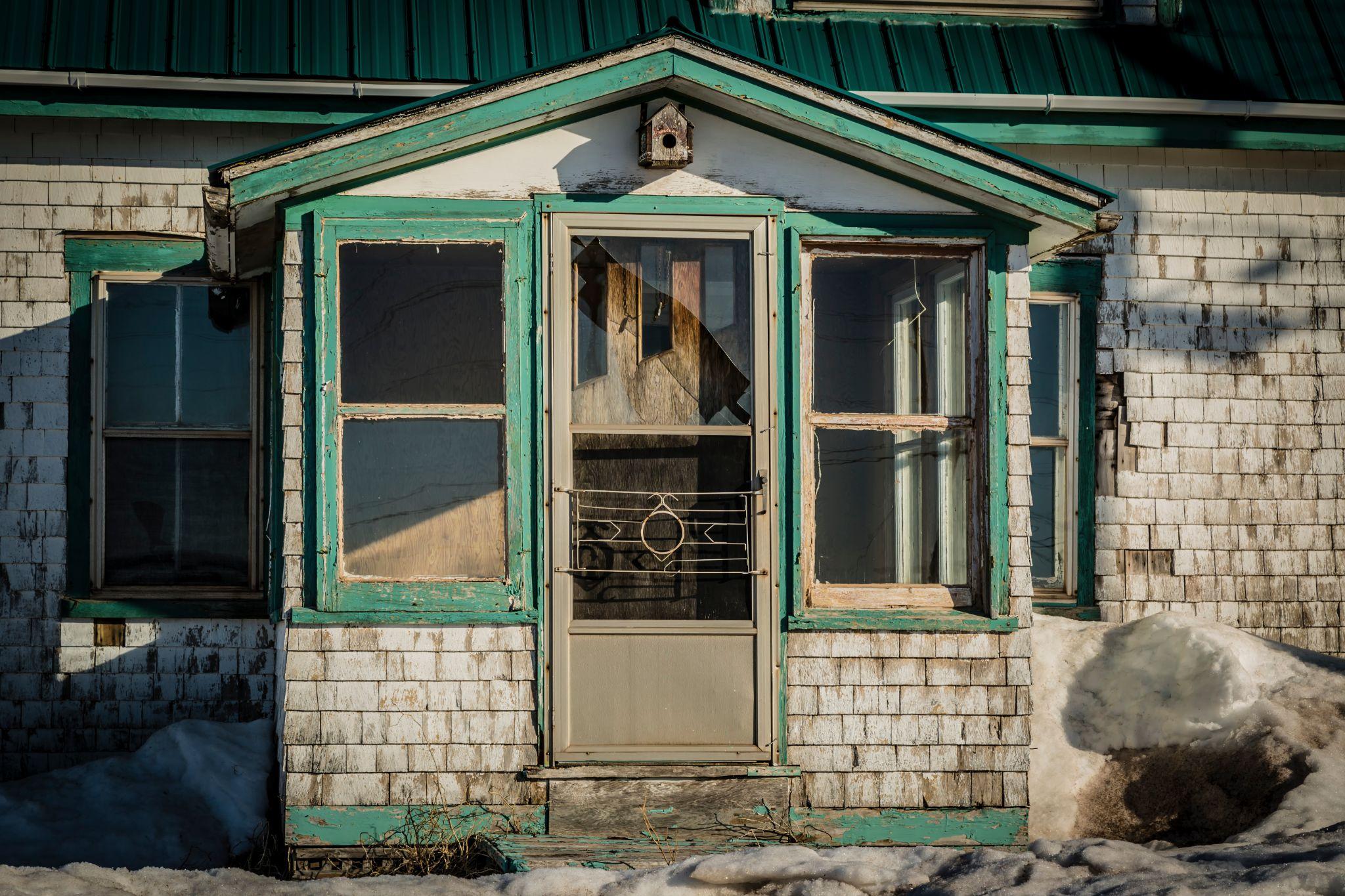 An old deteriorated house front