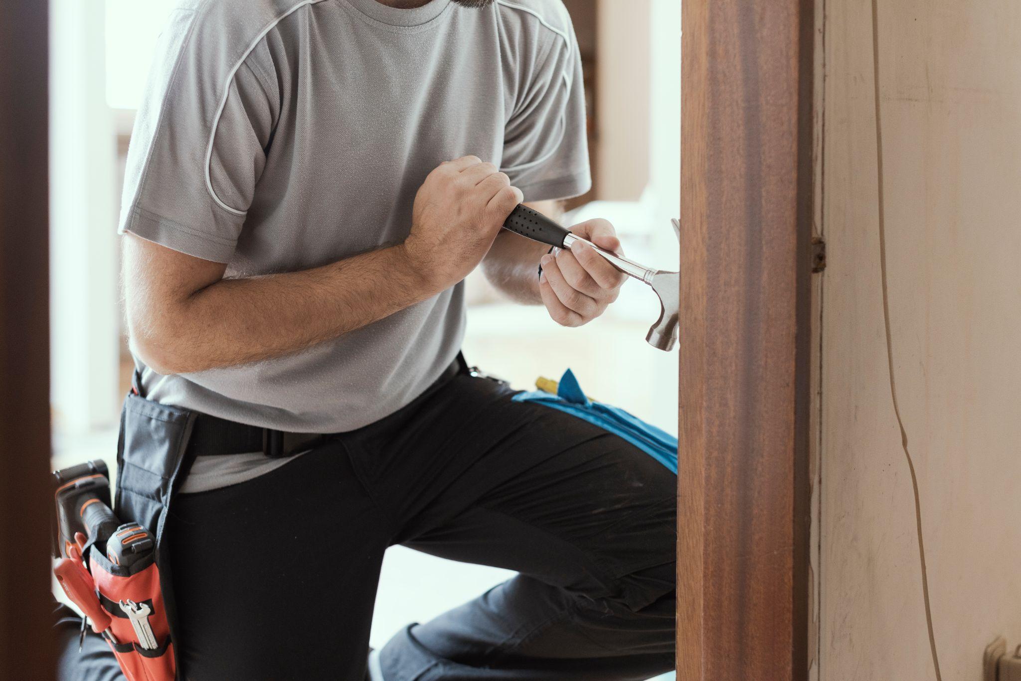 A man doing small home repairs