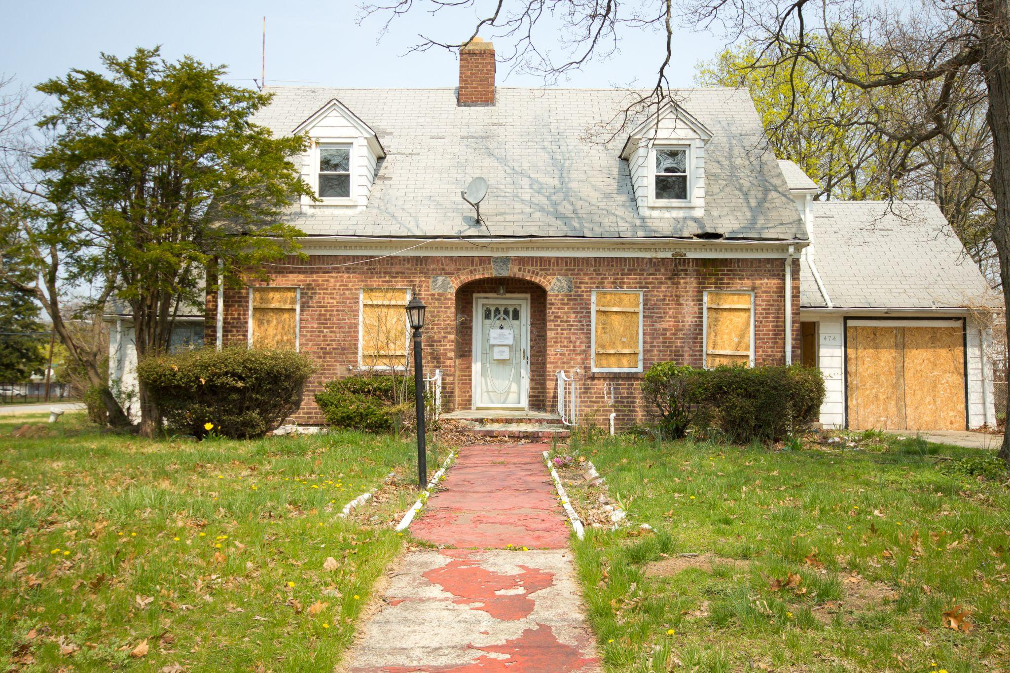 Boarded Up Home in Foreclosure