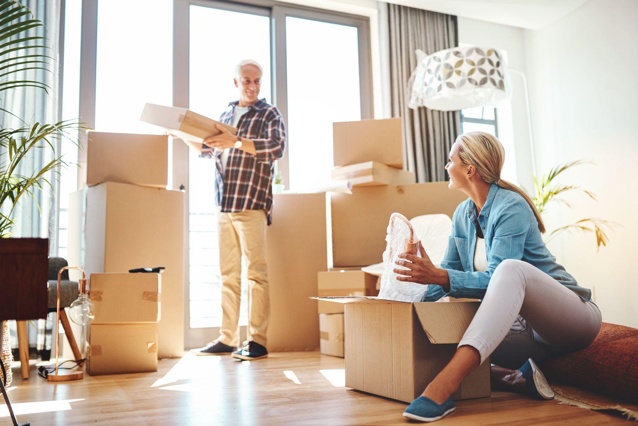 Couple packing and ready to move due to an emergency